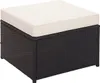 A black rattan ottoman with a cream cushion on a white background. Anteprima dell’immagine prodotto