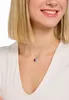 A woman wearing a necklace with a cocktail glass charm. Náhled obrázku produktu