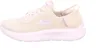 A side view of a beige Skechers sneaker against a white background. Náhled obrázku produktu