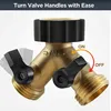 A brass Y-shaped hose splitter with black valve handles and a black cap on top, shown against a light gray and white background. Produktbild-Vorschau