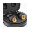 A pair of black wireless earbuds with wood accents are shown inside their charging case. Produktbild-Vorschau