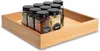 A wooden tray holding several spice jars. Náhled obrázku produktu