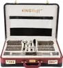 An open suitcase filled with cutlery, displayed on a white background. Voir les images du produit