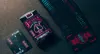A deck of Bicycle Cyberpunk Cyber City playing cards is shown on a textured surface. Voir les images du produit
