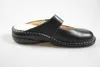 A black clog shoe on a white background. Podgląd zdjęcia produktu