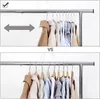 A comparison of how many clothes can fit on a clothes rack with different types of hangers. The top image shows fewer clothes with thicker hangers, and the bottom image shows more clothes with thinner hangers. Náhled obrázku produktu