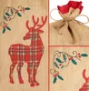 A collage of images showing a Christmas sack with a reindeer design and holly decorations. Anteprima dell’immagine prodotto