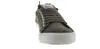 A close-up, front-facing view of a single green sneaker against a white background. Voir les images du produit