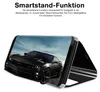 A black car is displayed on a phone screen, which is propped up in a stand. Produktbild-Vorschau