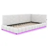 A white upholstered daybed with a hexagonal pattern on the headboard and a built-in ambient light. Podgląd zdjęcia produktu