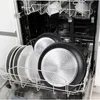 A dishwasher rack filled with plates and frying pans. Voir les images du produit