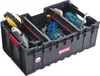 A tool box filled with various tools, including headphones, a drill, wrenches, and a screwdriver. Náhled obrázku produktu