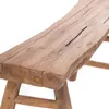 A close-up view of a rustic wooden bench. Produktbild-Vorschau