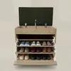 A shoe cabinet with a lift-up seat and pull-out shelves, displaying various shoes. Náhľad obrázku produktu