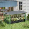 A raised garden bed with a protective cover is set up on a grassy lawn next to a house and patio. Produktbild-Vorschau