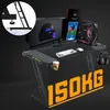 A gaming desk setup with a computer, monitor, keyboard, mouse, and headphones, with prominent text indicating weight capacity. Produktbild-Vorschau