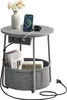 A round side table with integrated power outlets and USB ports, featuring a phone and smartwatch charging. Produktbild-Vorschau