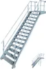 A galvanized steel staircase with handrails and a platform, shown against a white background. A smaller, similar staircase is visible in the lower right corner. Anteprima dell’immagine prodotto
