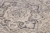 A close-up view of a rug with a detailed pattern. Produktbild-Vorschau