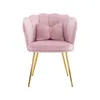 A pink velvet chair with gold legs and a bow-shaped pillow. Produktbild-Vorschau
