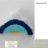 A knitted cloud-shaped pillow with rainbow stripes against a light-colored wall. Produktbild-Vorschau
