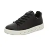 A black leather sneaker with a white sole is shown against a white background. Produktbild-Vorschau