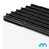 A close-up view of the top of a white electric heater with a black ribbed grill. Voir les images du produit