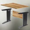 An exploded view of desk legs and a tabletop, showing how they assemble. Anteprima dell’immagine prodotto