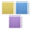 Three puzzle mats in yellow, blue, and purple are arranged in a top-left, top-right, and bottom-center position against a white background. Voir les images du produit