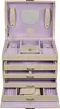 An open jewelry box with multiple compartments and drawers. Produktbild-Vorschau