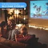 Three children are sitting on a couch watching a projector screen in a dimly lit room, with string lights in the background. Produktbild-Vorschau