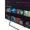 A television screen displaying a streaming service interface with movie posters. Produktbild-Vorschau
