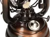 Close-up of the top part of an oil lamp. Voir les images du produit