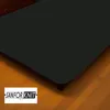 A black fitted sheet is shown on a bed, with a wooden floor and dresser visible in the background. A logo is present in the bottom left corner. Produktbild-Vorschau