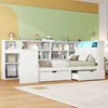 A white bed frame with integrated shelving and drawers, set against a wall with green and yellow sections. The bed is made with bedding and pillows. Náhľad obrázku produktu