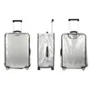 Three views of a silver suitcase covered in a clear protective cover. Anteprima dell’immagine prodotto