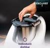 A hand is shown adjusting a silicone attachment on a kitchen appliance. Podgląd zdjęcia produktu