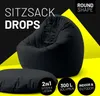 A black beanbag chair and a round cushion are displayed against a black and yellow background, with text and icons highlighting product features. Náhľad obrázku produktu