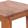 A close-up view of the corner of a wooden stool. Produktbild-Vorschau