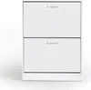 A white shoe cabinet with two drawers. Voir les images du produit