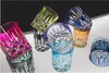 A collection of colorful crystal glasses arranged in a studio setting. Produktbild-Vorschau