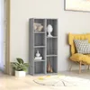 A gray bookshelf with items on display, next to a yellow chair. Voir les images du produit