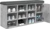 A shoe cabinet with a padded seat on top, filled with various shoes. Náhled obrázku produktu
