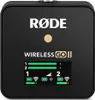 A black Rode Wireless GO II device with a small screen displaying battery and signal indicators. Náhled obrázku produktu