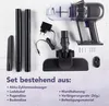 A collection of vacuum cleaner parts and accessories laid out on a light gray and white surface. Produktbild-Vorschau