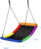A colorful nest swing is shown hanging against a white background, with dimensions indicated by lines and text. Produktbild-Vorschau