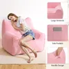A woman is relaxing on a pink beanbag chair, with inset images highlighting the chair's features. Náhled obrázku produktu