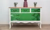 A dresser with a football field design on its drawers, placed against a white wall. Produktbild-Vorschau