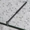 A close-up view of a shower enclosure support arm against a tiled wall. Produktbild-Vorschau