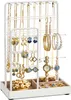 A white jewelry stand filled with various necklaces, earrings, bracelets, and a watch. Produktbild-Vorschau